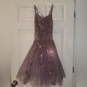 Weissman purple and sequins dance costumes